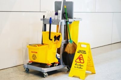 a complete set of multi-function janitor cleaning trolley equipped with tools and signboard